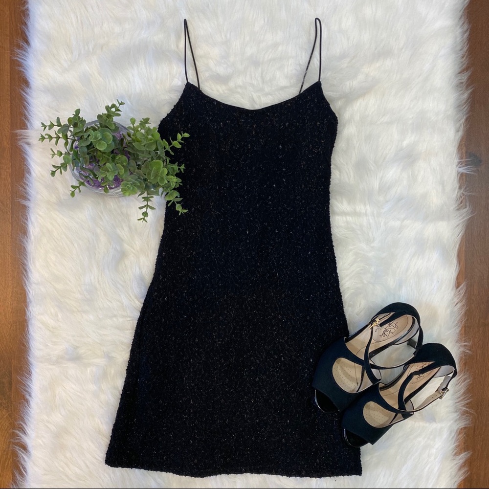 Black sleeveless dress by Byer Too! California